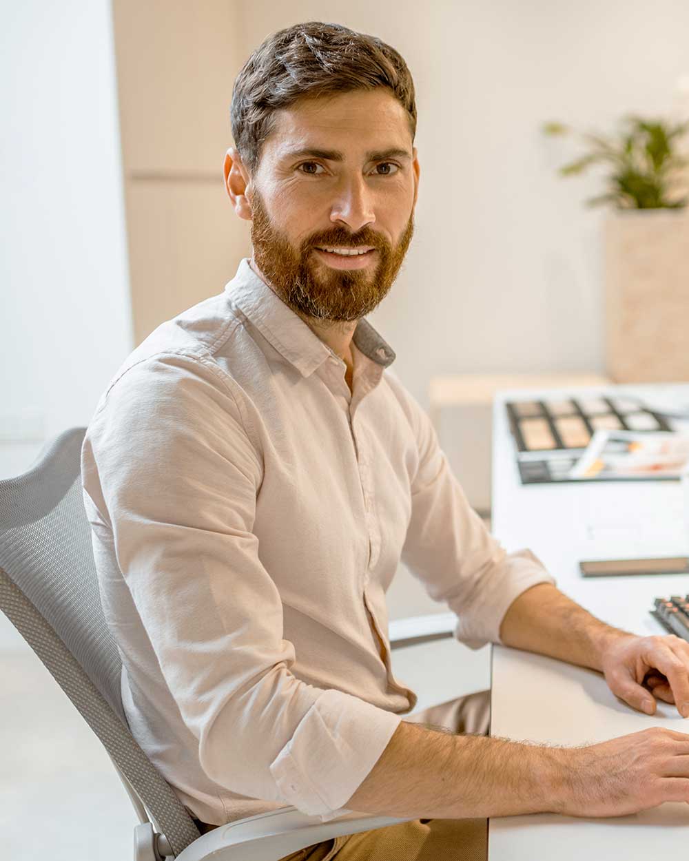 inteiror designer working in the office 99L5A6V